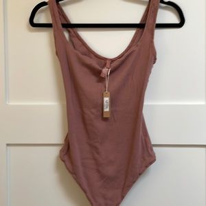 NWT Skims ribbed body suit in Rose Clay size M